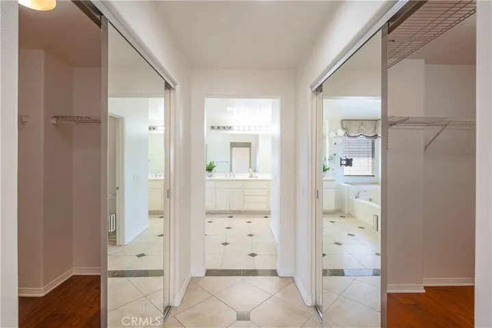 PRIMARY WALK IN CLOSETS/ PRIMARY BATH