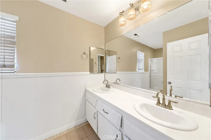 Bathroom With Dual Sinks And Updated Fixtures
