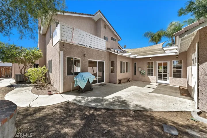 Rear Exterior View Highlighting Patio Area And Home Layout