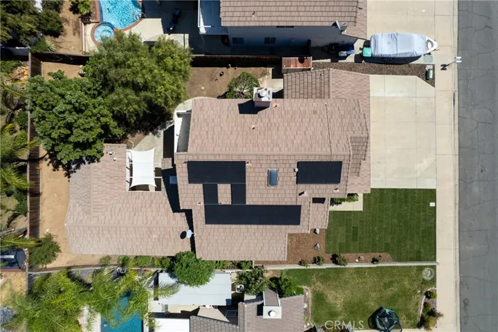Top-Down Aerial View Of Property Layout And Backyard Space
