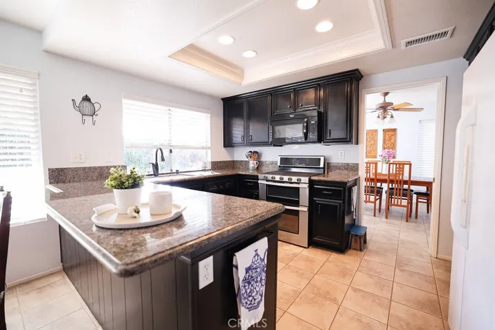 Kitchen with recess lighting and newer gas  range/convection oven