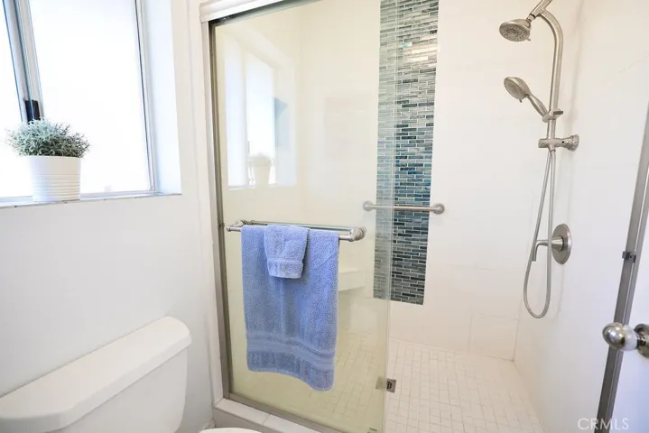 Remodeled Primary Bathroom with walk-in shower