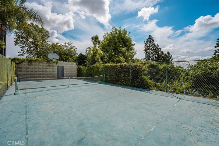 Endless possibilities for this sports court with big storage room. How about your own pickleball court?  You'll be very popular!