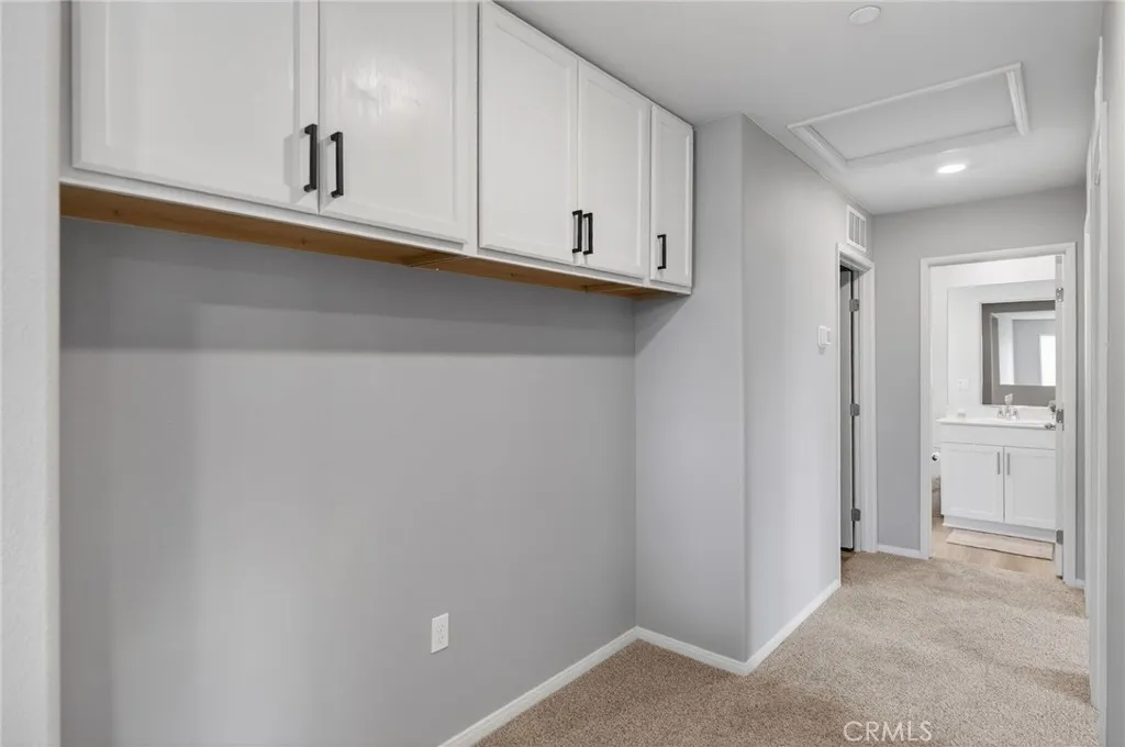 Upstairs Hallway with Cabinet storage