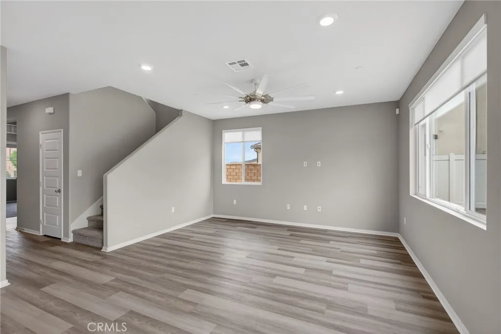 Family Room -  Ceiling Fan /  Electric Blinds