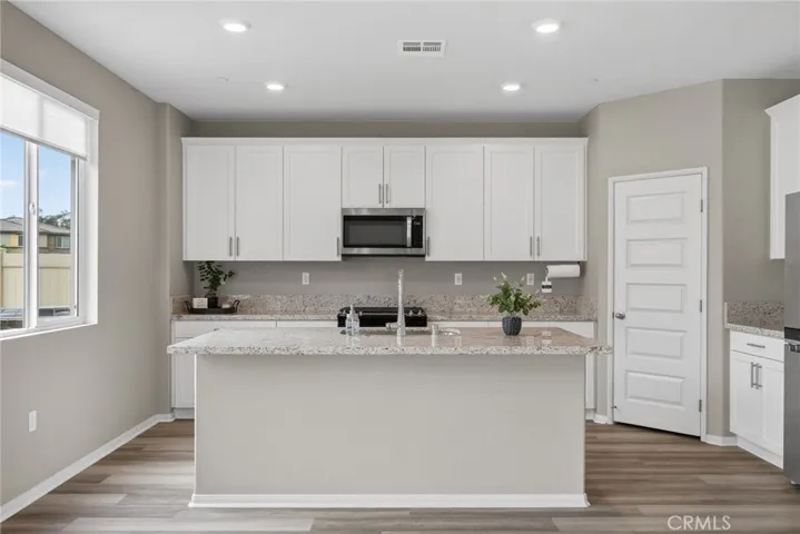 Large island with granite counters - perfect for bar stool chairs -  Walk in Pantry