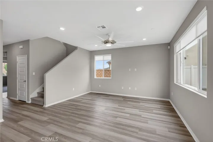 Family Room -  Ceiling Fan /  Electric Blinds