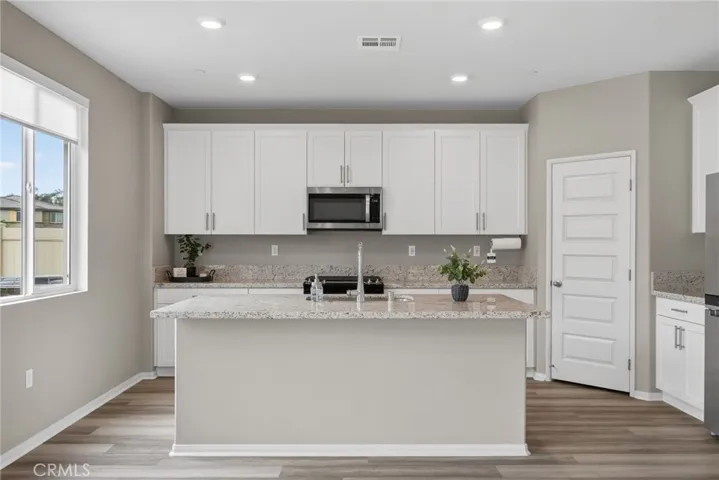 Large island with granite counters - perfect for bar stool chairs -  Walk in Pantry