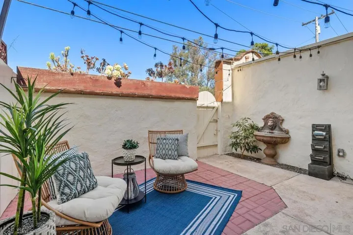 Private back patio with direct access to walkway behind, cafe lights convey, private laundry room with full size washer and brand new never used dryer.