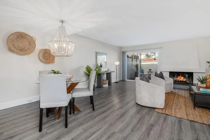 Freshi paint, luxury vinyl plank flooring, brand new decorative chandlier, loads of natural light and direct access to back patio area.