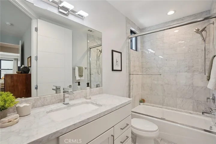 Ensuite bathroom to downstairs bedroom