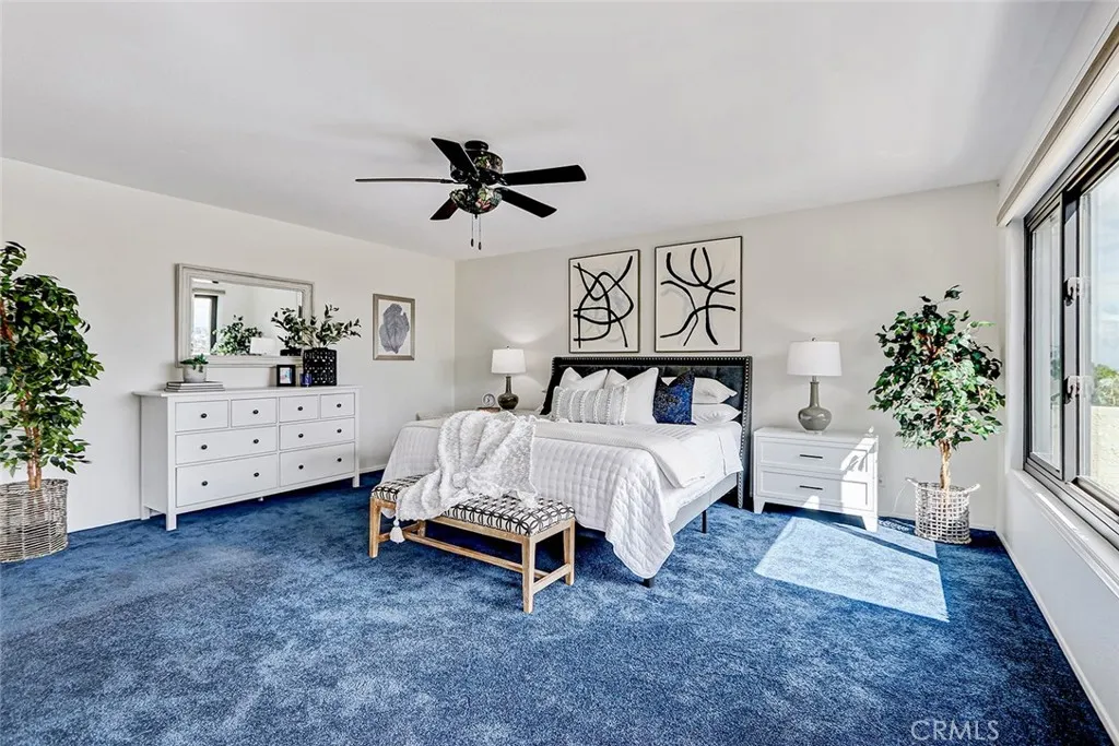 Main bedroom has large windows and so much natural light