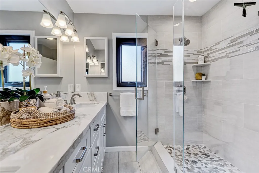 Main full bathroom is more recently remodeled