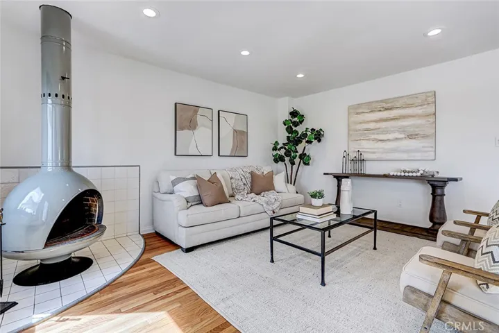 Living room area with free standing fireplace