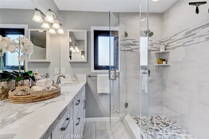 Main full bathroom is more recently remodeled