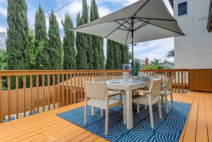 Huge main deck for dining and entertaining located just off the dining, kitchen and breakfast areas.