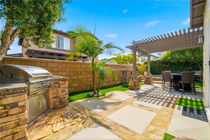 One of the largest backyards in the neighborhood, designed for entertaining.