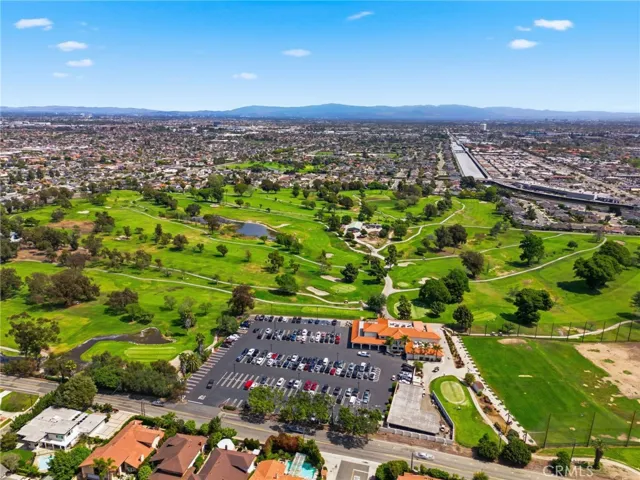 Aerial shot highlighting nearby parks, Meadowlark Golf Course, and open space.