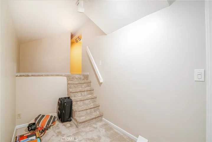 Head up the mini stairs to find even more storage.