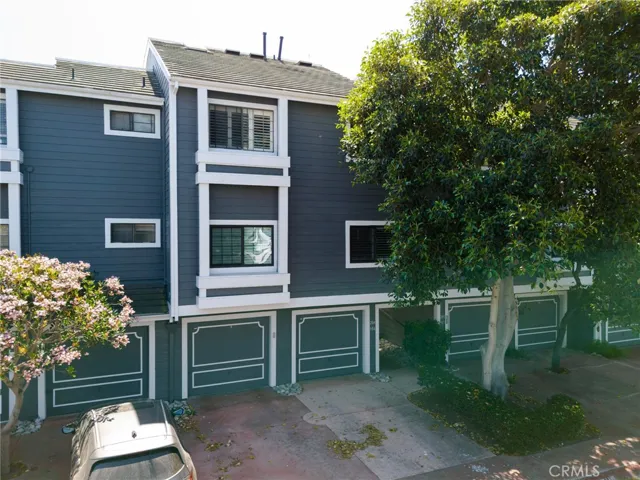 The unit features a very coveted driveway and parking space in front of the garage.