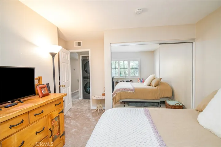 Another view of the second bedroom towards the closet and entryway.