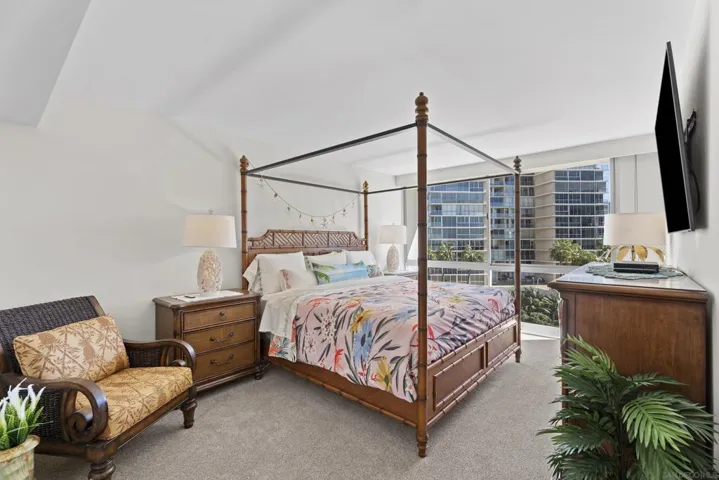 Serene primary bedroom has ample space, a gigantic walk in closet and a luxurious en suite bathroom.