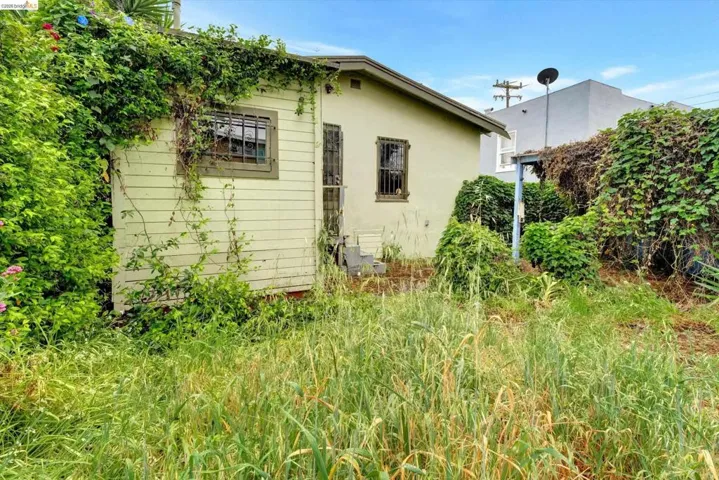 View of property exterior with stucco siding