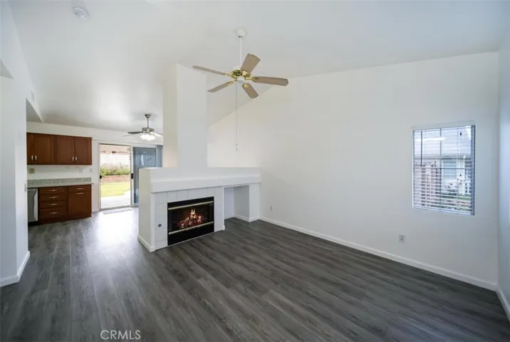 Entry to living room, with fireplace