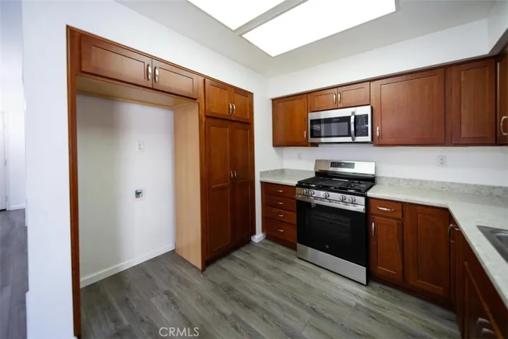 Lazy Susan and spice racks next to sink