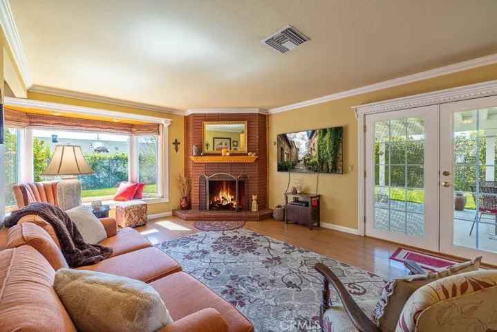 Opens to the Light and Bright Living Room, with French Doors out to the Lovely Yard