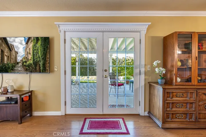 Great French Doors that lead out to the covered patio and backyard!