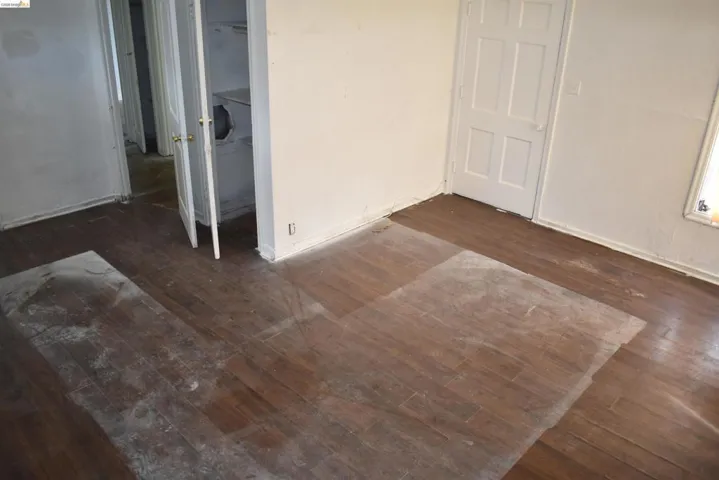 Existing living space with natural light and strong foundation for updates or redesign.