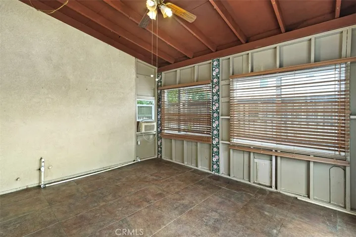 Enclosed patio (not permitted).