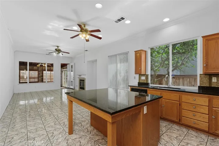 Great room contains kitchen and spacious family room.
