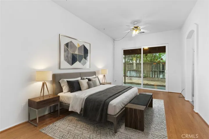 This photo of the primary bedroom is VIRTUALLY STAGED.