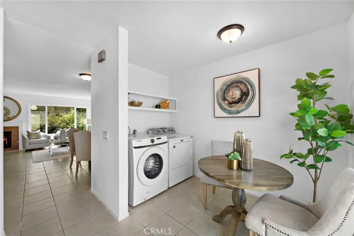 Inside laundry closet (washer & dryer included) and Breakfast nook in kitchen overlooks patio