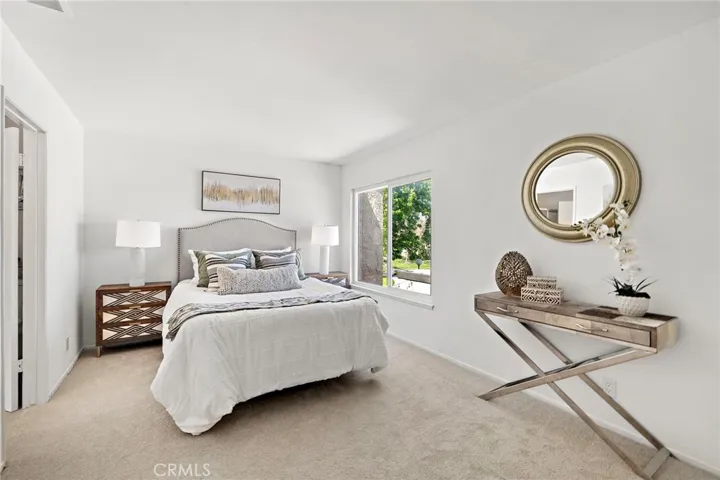 1 of 2 spacious bedrooms upstairs that share a jack & jill bathroom