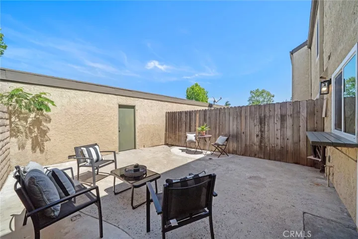 Large private patio and door to 2 car garage