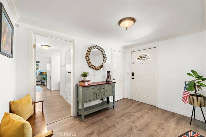 Front door opens to large formal foyer