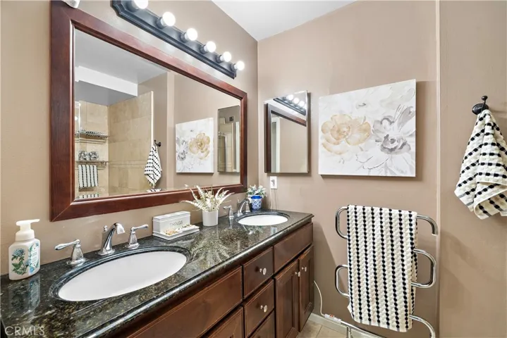 granite countertops, and dual sinks