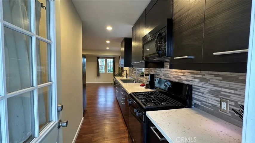View of kitchen from back entrance