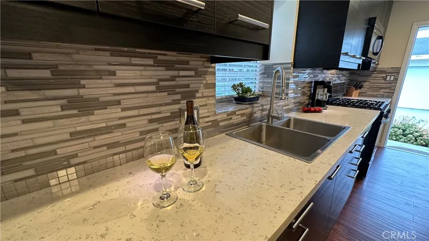 View of the kitchen counters and side door.
