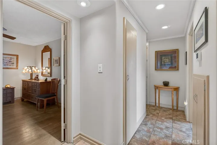 The hallway leading to the bedrooms and bathroom.