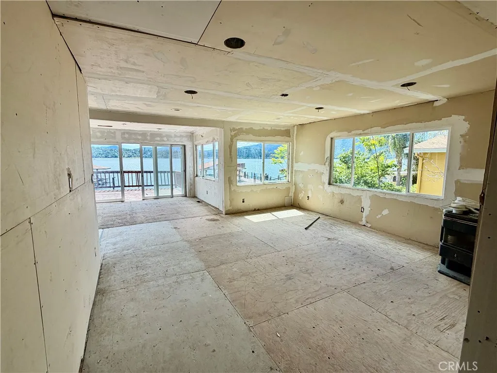 Unfinished Living Room and dinning area in back Unfinished Living Room and dinning area in back
