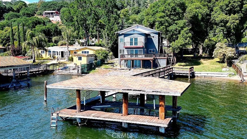 Boat dock and house in background
