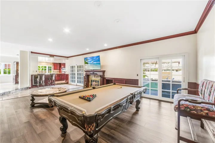 Hugh Family room, with a pool table included.