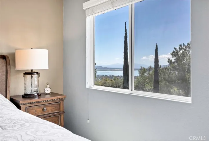 overlooking lake view in primary bedroom