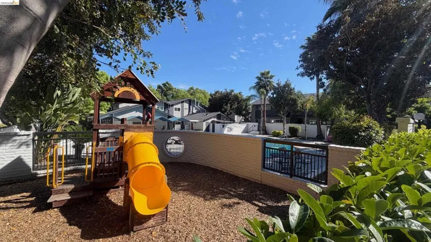Communal playground with a residential view