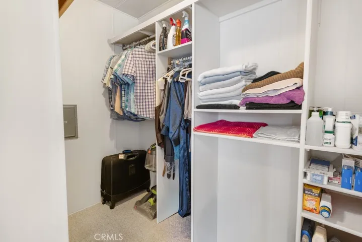 Walk-in closet in master bathroom.