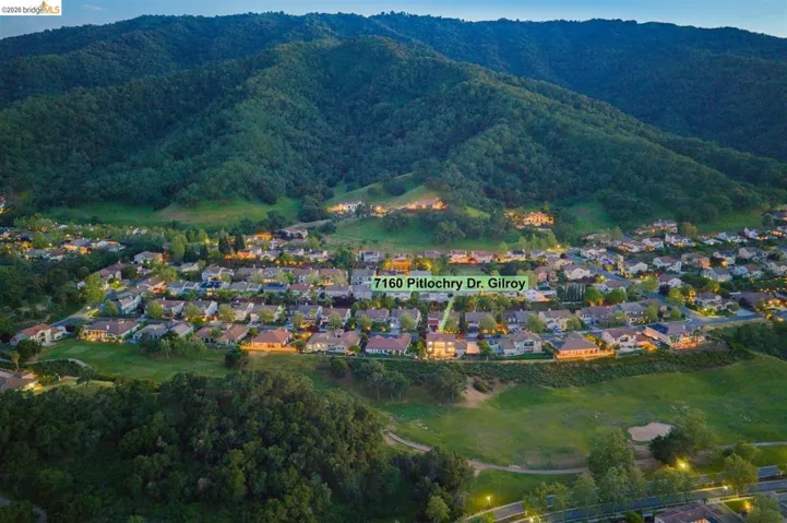 Aerial perspective of suburban area featuring mountains